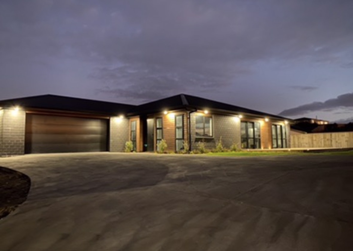 New build exterior lighting showing soffit downlights and entrance lighting by Boyd Electrical